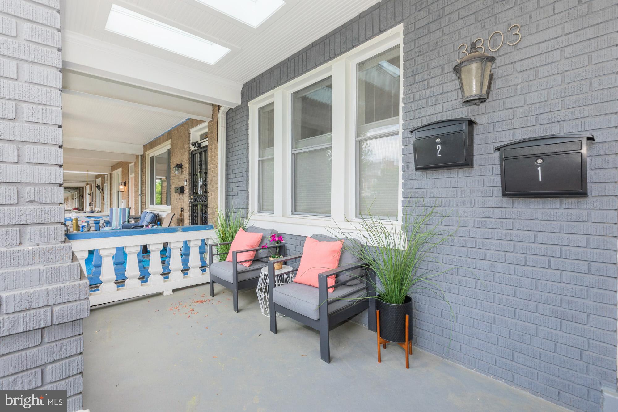 3803 10th Street Northwest, Unit 1 Washington, DC 20011 - Photo 5 of 71 a balcony with furniture and potted plants