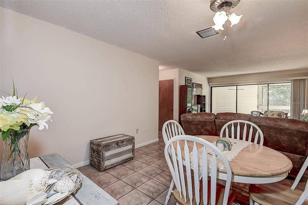 1500 Sunset Road, Unit G4 Tarpon Springs, FL 34689 - Photo 17 of 44 a bedroom with furniture and a window