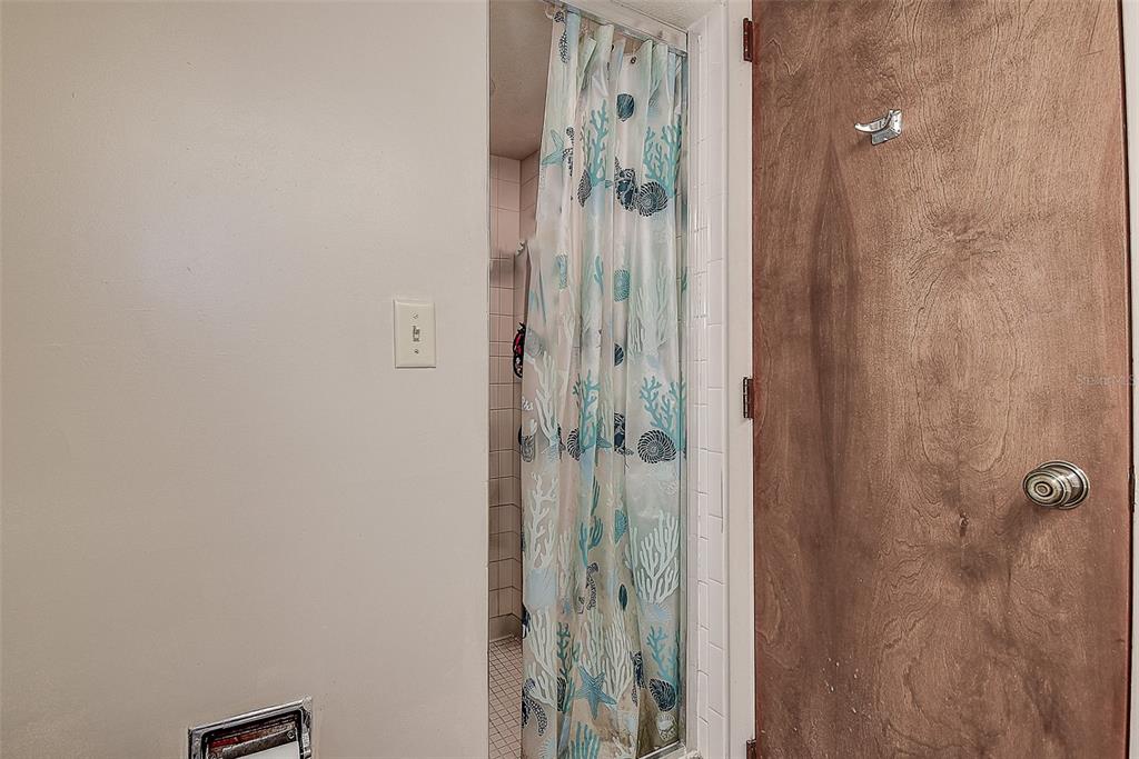 1500 Sunset Road, Unit G4 Tarpon Springs, FL 34689 - Photo 22 of 44 a bathroom with a shower