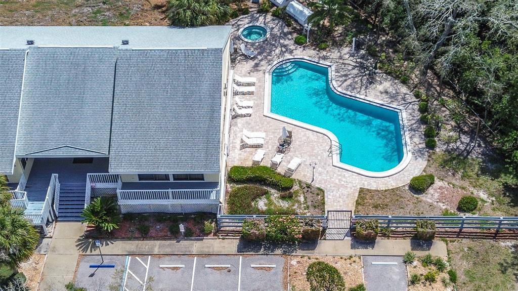1500 Sunset Road, Unit G4 Tarpon Springs, FL 34689 - Photo 41 of 44 an aerial view of a house with swimming pool