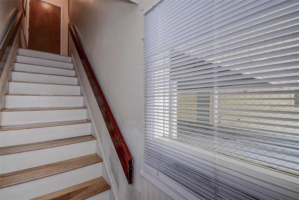 1500 Sunset Road, Unit G4 Tarpon Springs, FL 34689 - Photo 8 of 44 a view of entryway with wooden floor