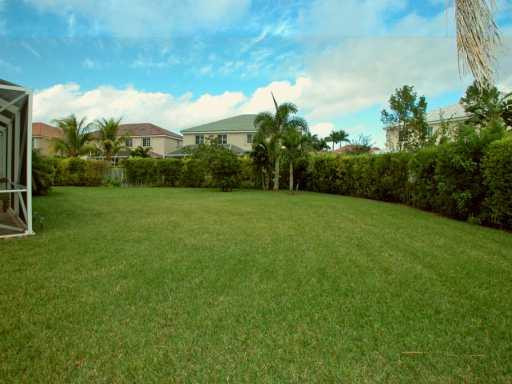 4459 Stone Ridge Way Weston, FL 33331 - Photo 8 of 8 a view of a grassy field