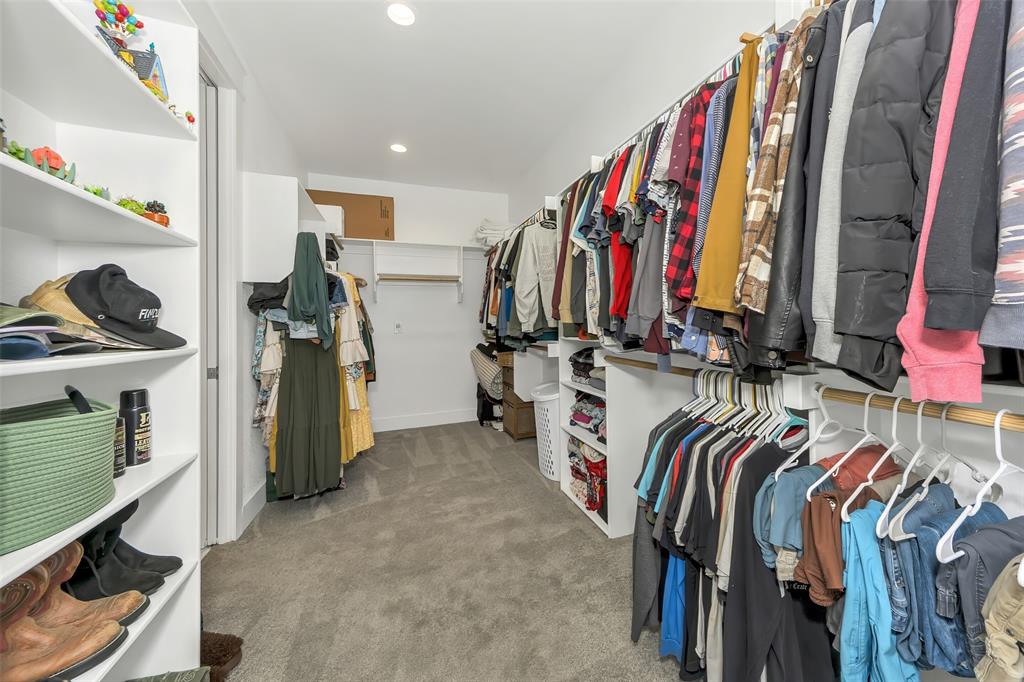 1040 Agnes Street North Springtown, TX 76082 - Photo 19 of 40 Walk in closet featuring light colored carpet