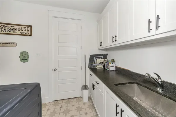 a view of a entryway door with furniture