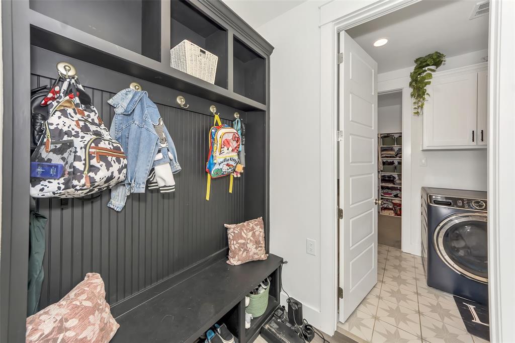 1040 Agnes Street North Springtown, TX 76082 - Photo 22 of 40 Mudroom with light flooring, washer / clothes dryer, and recessed lighting