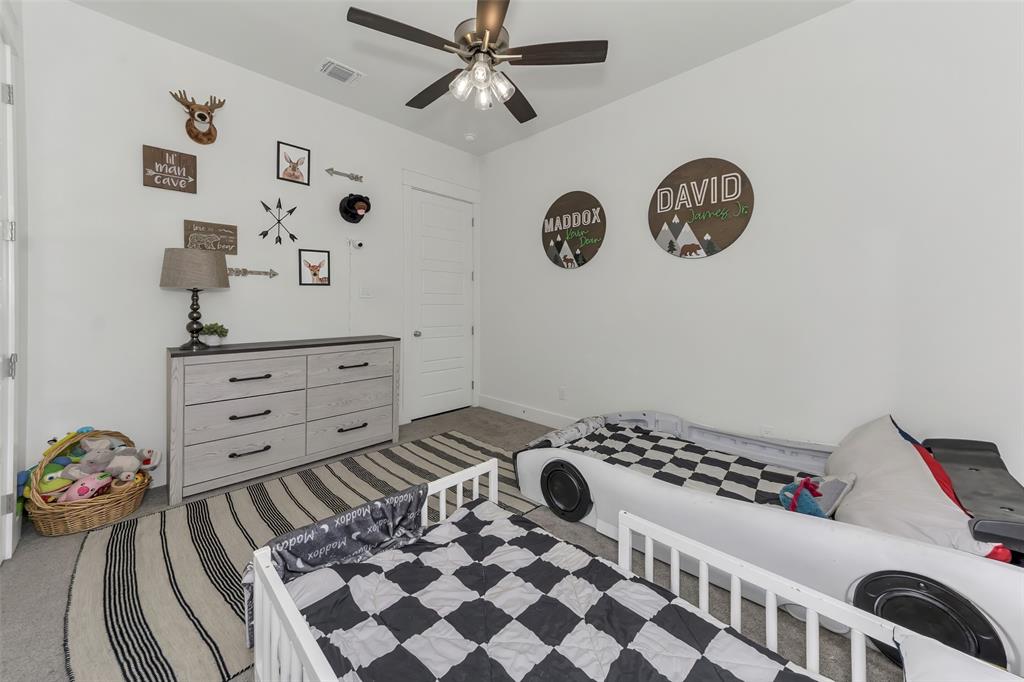 1040 Agnes Street North Springtown, TX 76082 - Photo 30 of 40 Bedroom with ceiling fan and baseboards