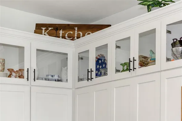 a view of a kitchen with appliances