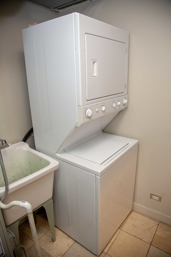 1607 Simpson Street, Unit 2E Evanston, IL 60201 - Photo 16 of 21 a utility room with dryer and washer