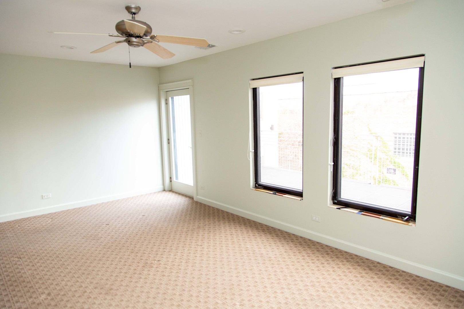 1607 Simpson Street, Unit 2E Evanston, IL 60201 - Photo 17 of 21 a view of an empty room with a window