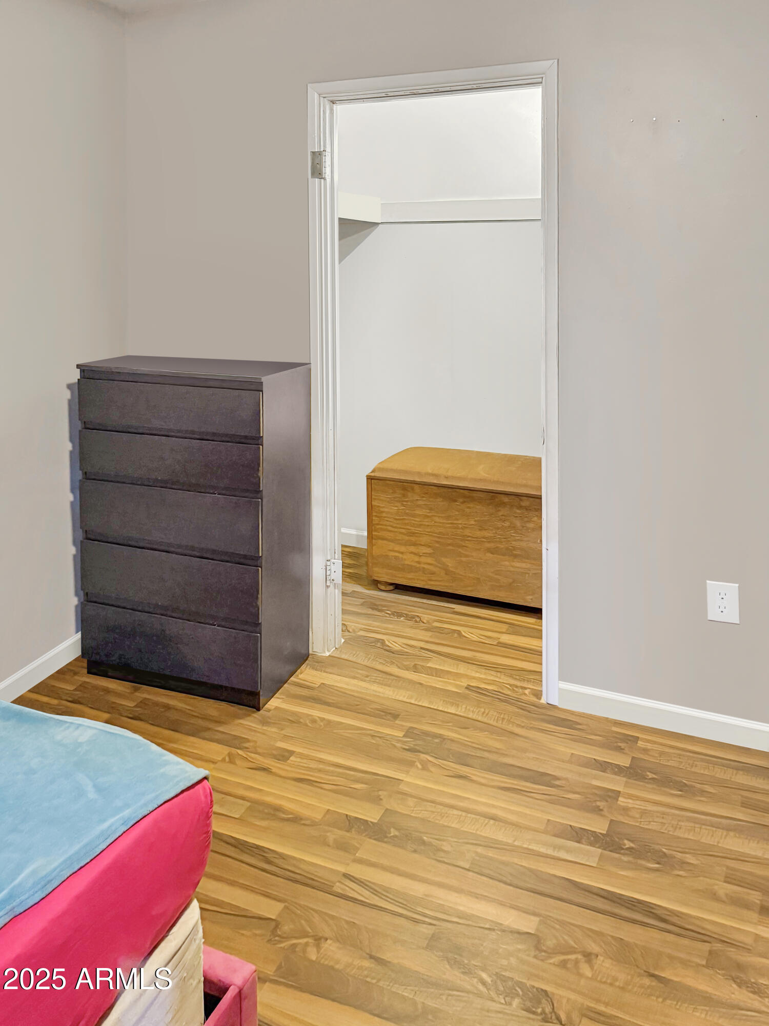 310-312 4th Street Winkelman, AZ 85192 - Photo 11 of 13 a bedroom with a bed and a dresser