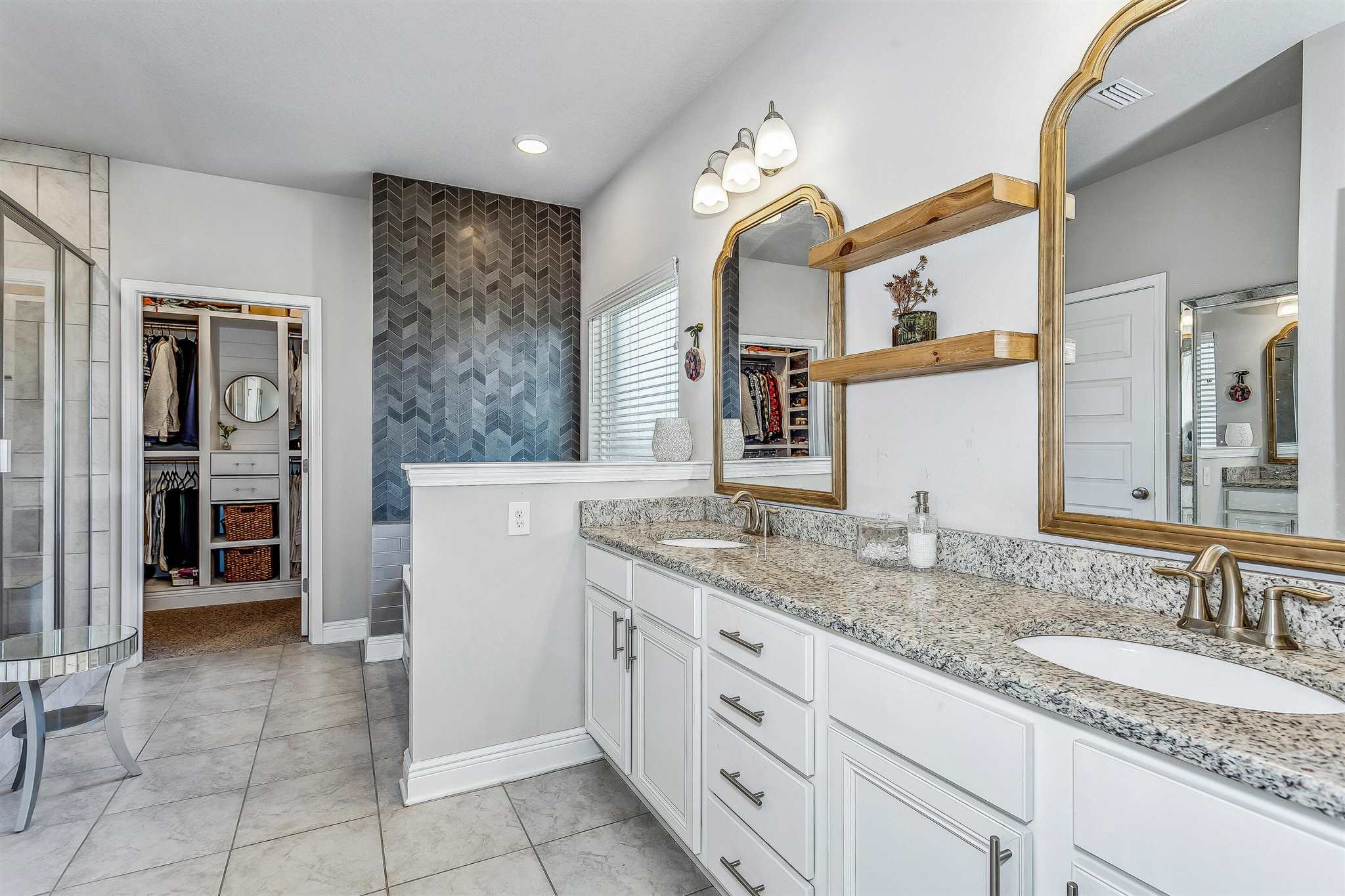 2792 Elkhorn Drive Pace, FL 32571 - Photo 26 of 50 a bathroom with a granite countertop sink and a mirror