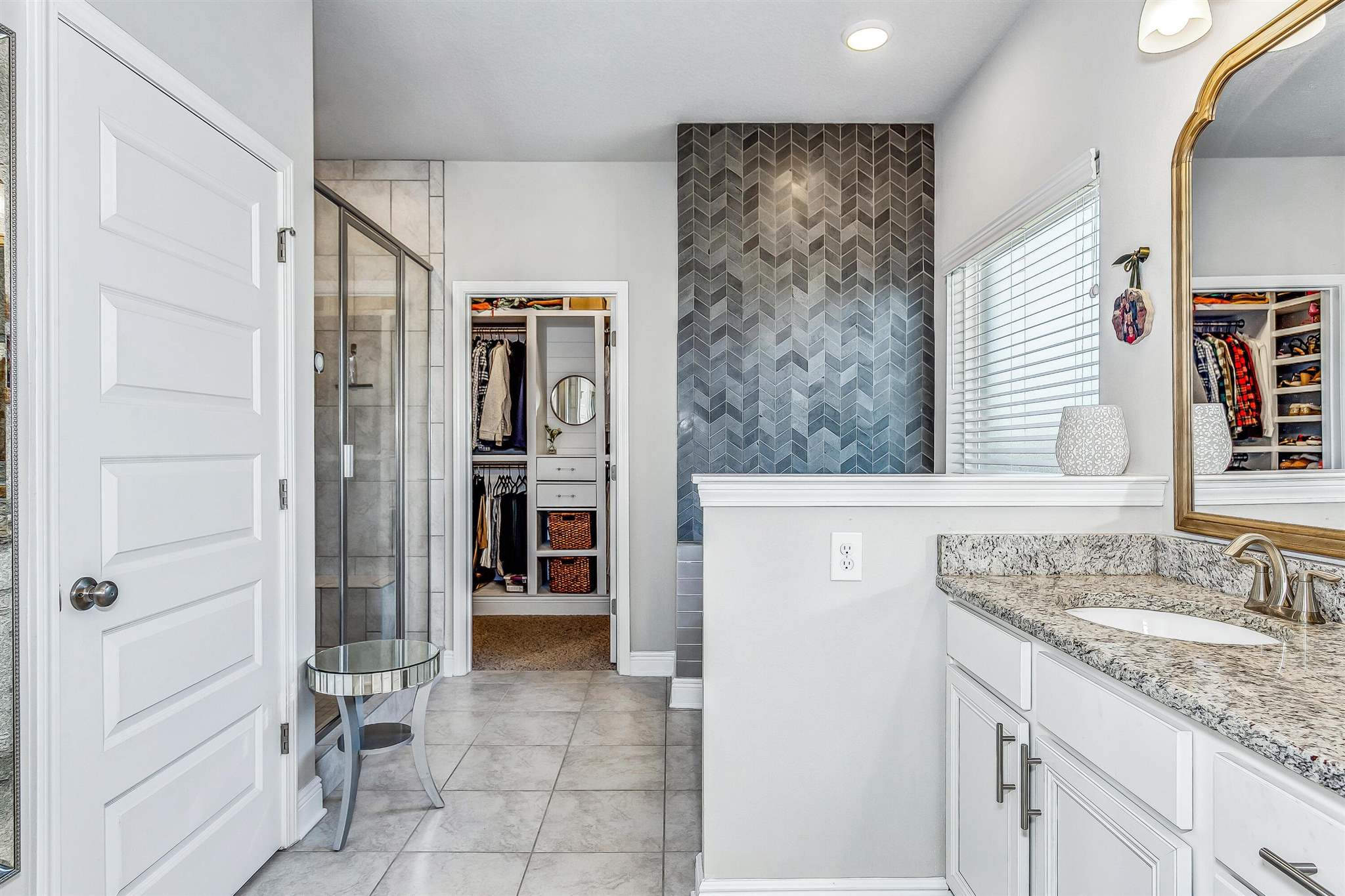 2792 Elkhorn Drive Pace, FL 32571 - Photo 27 of 50 a bathroom with a granite countertop sink and a mirror