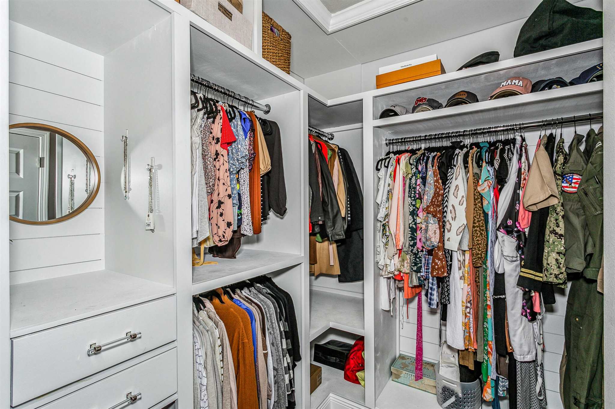 2792 Elkhorn Drive Pace, FL 32571 - Photo 30 of 50 a view of walk in closet with clothes and shoes