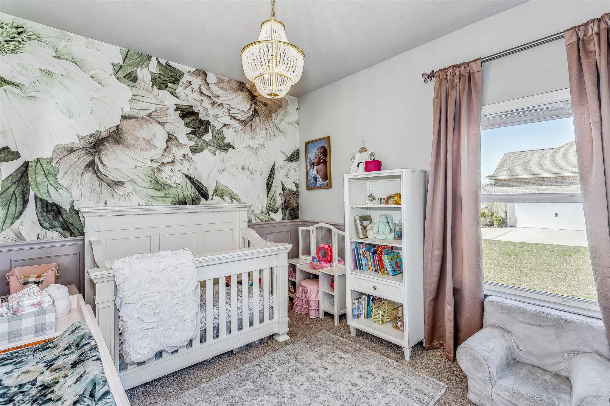 2792 Elkhorn Drive Pace, FL 32571 - Photo 34 of 50 a bedroom with furniture and a large window