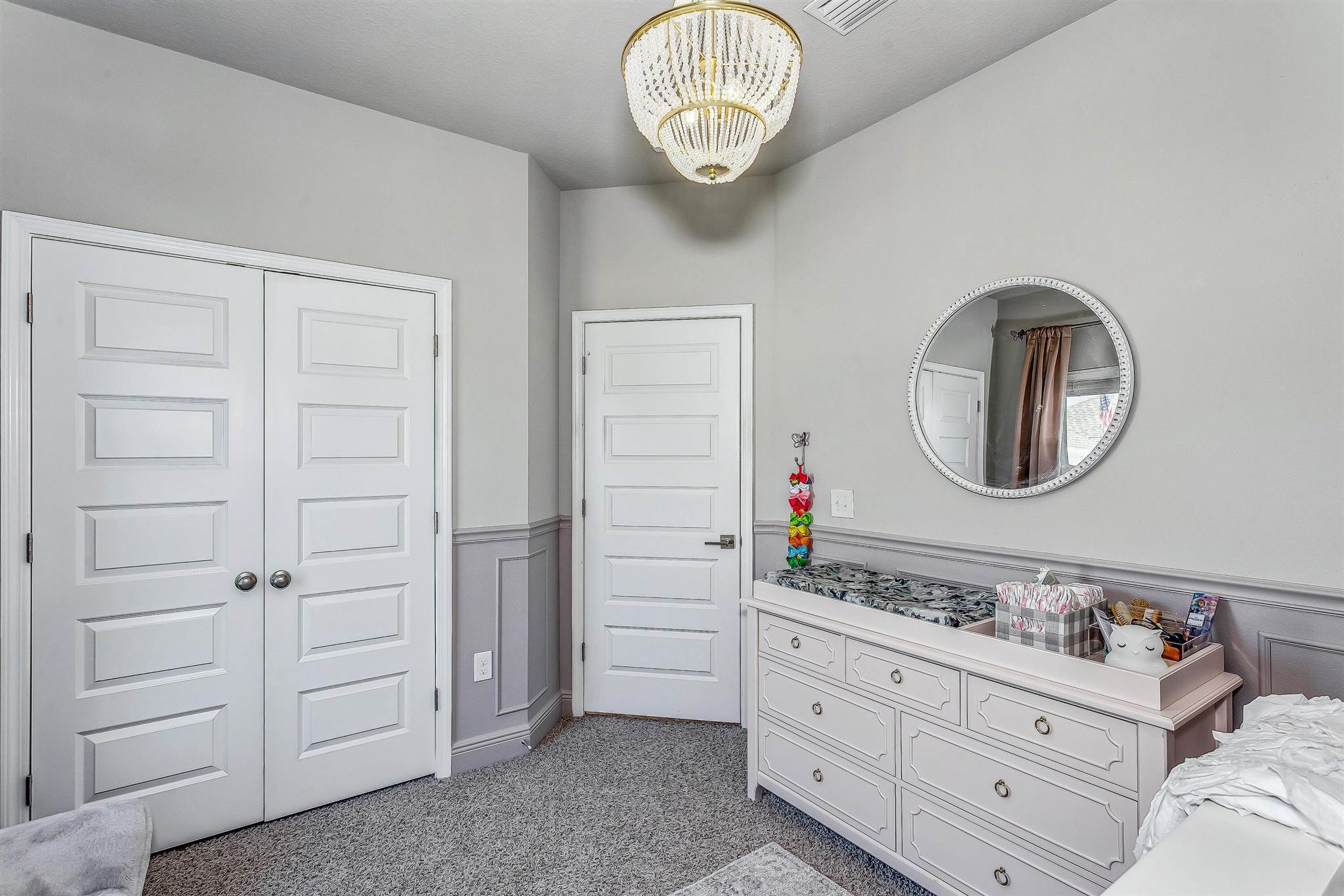 2792 Elkhorn Drive Pace, FL 32571 - Photo 35 of 50 a bathroom with a mirror and a sink with mirror
