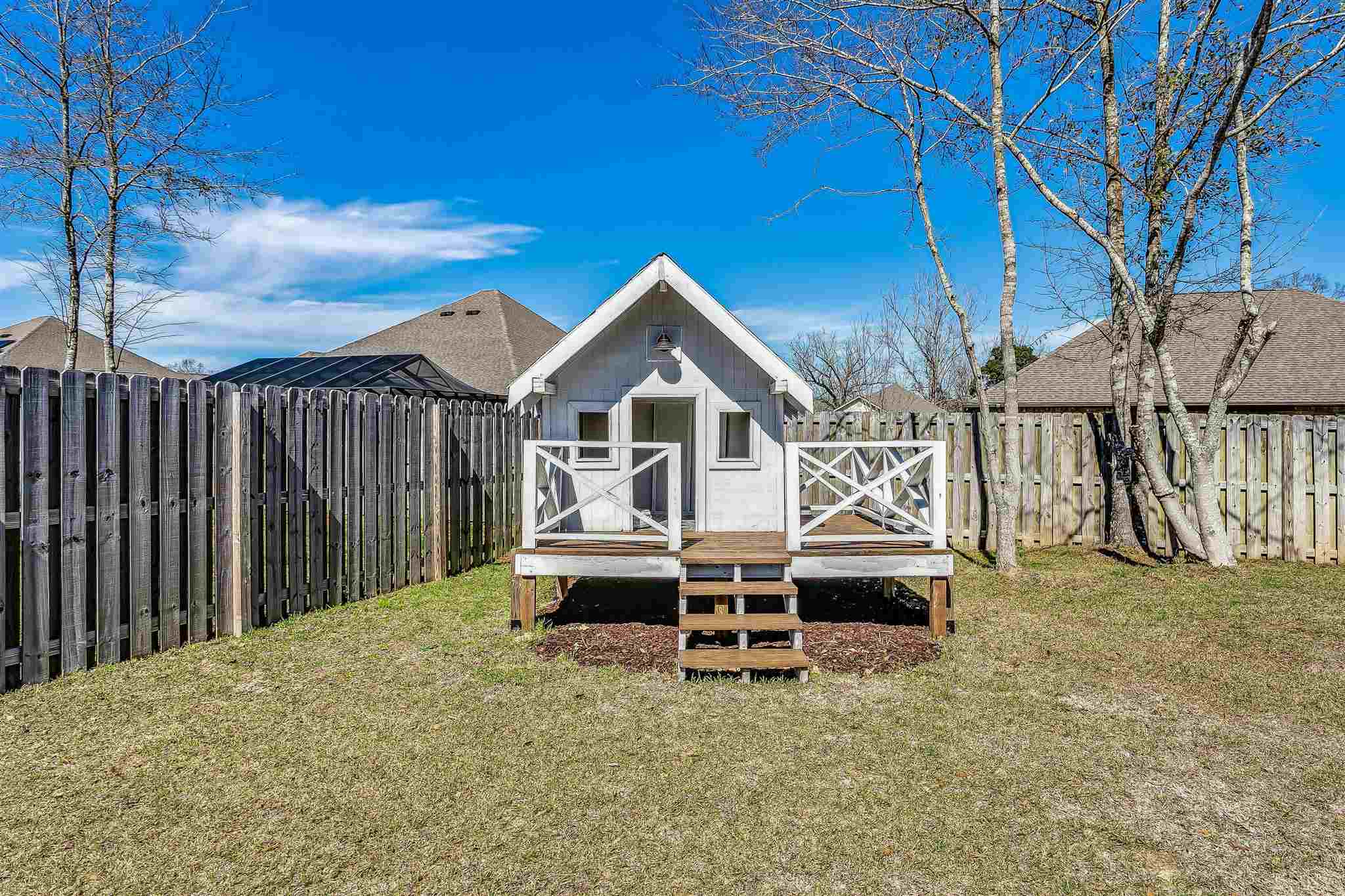2792 Elkhorn Drive Pace, FL 32571 - Photo 48 of 50 a view of backyard with deck and outdoor seating