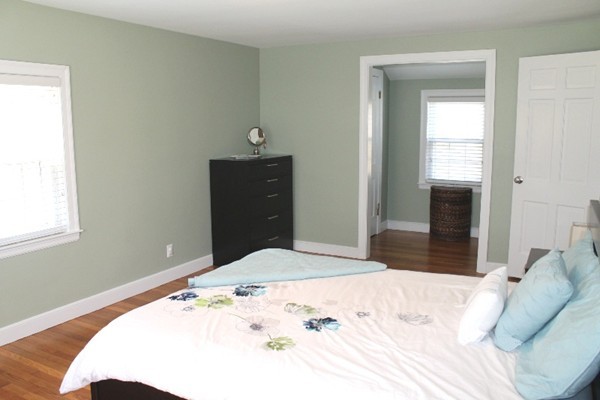 10 Longfellow Road Lexington, MA 02420 - Photo 17 of 29 a bedroom with a bed and a window