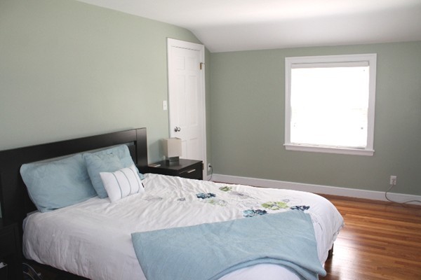 10 Longfellow Road Lexington, MA 02420 - Photo 18 of 29 a bedroom with a bed and window