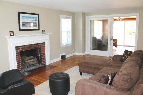 10 Longfellow Road Lexington, MA 02420 - Photo 2 of 29 a living room with furniture and a fireplace