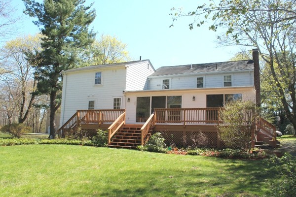 10 Longfellow Road Lexington, MA 02420 - Photo 28 of 29 front view of a house with a yard