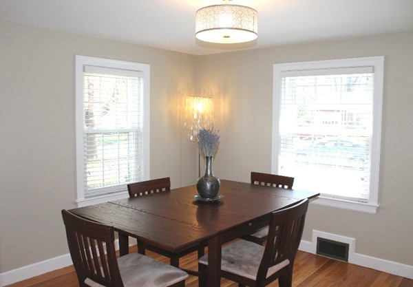 10 Longfellow Road Lexington, MA 02420 - Photo 4 of 29 a view of a dining room with a table and chairs