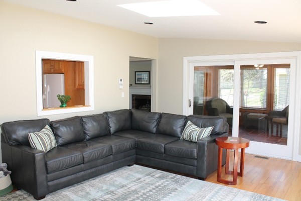 10 Longfellow Road Lexington, MA 02420 - Photo 7 of 29 a living room with furniture and a large window