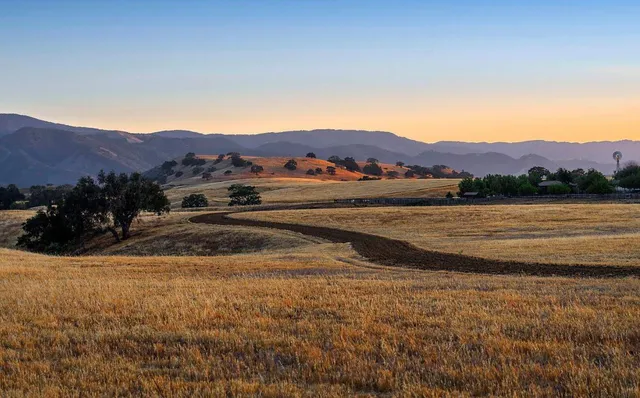 a view of lake with mountain