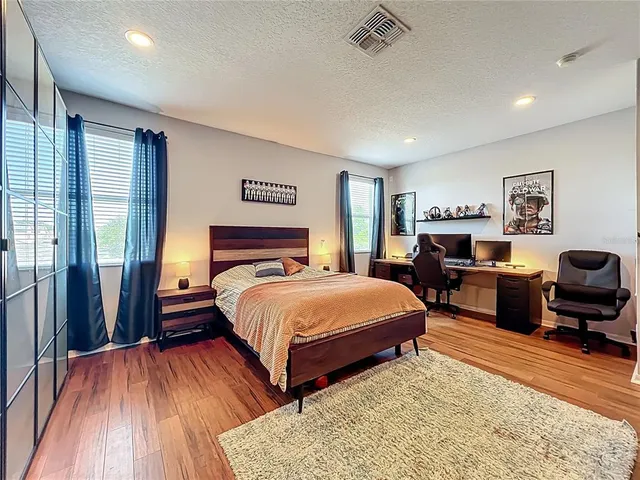 an aerial view of a house with a garden