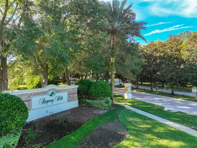 an aerial view of a house with a swimming pool