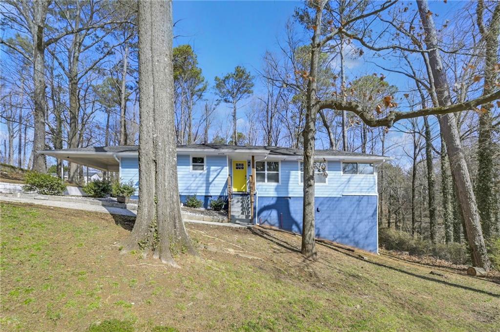 a view of a chairs and tables in the patio