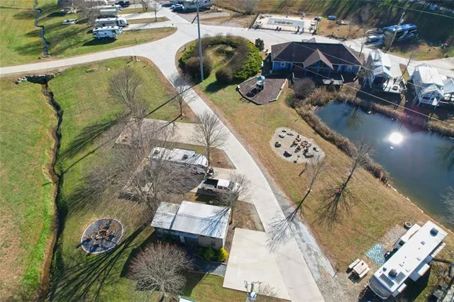 a view of swimming pool with outdoor seating