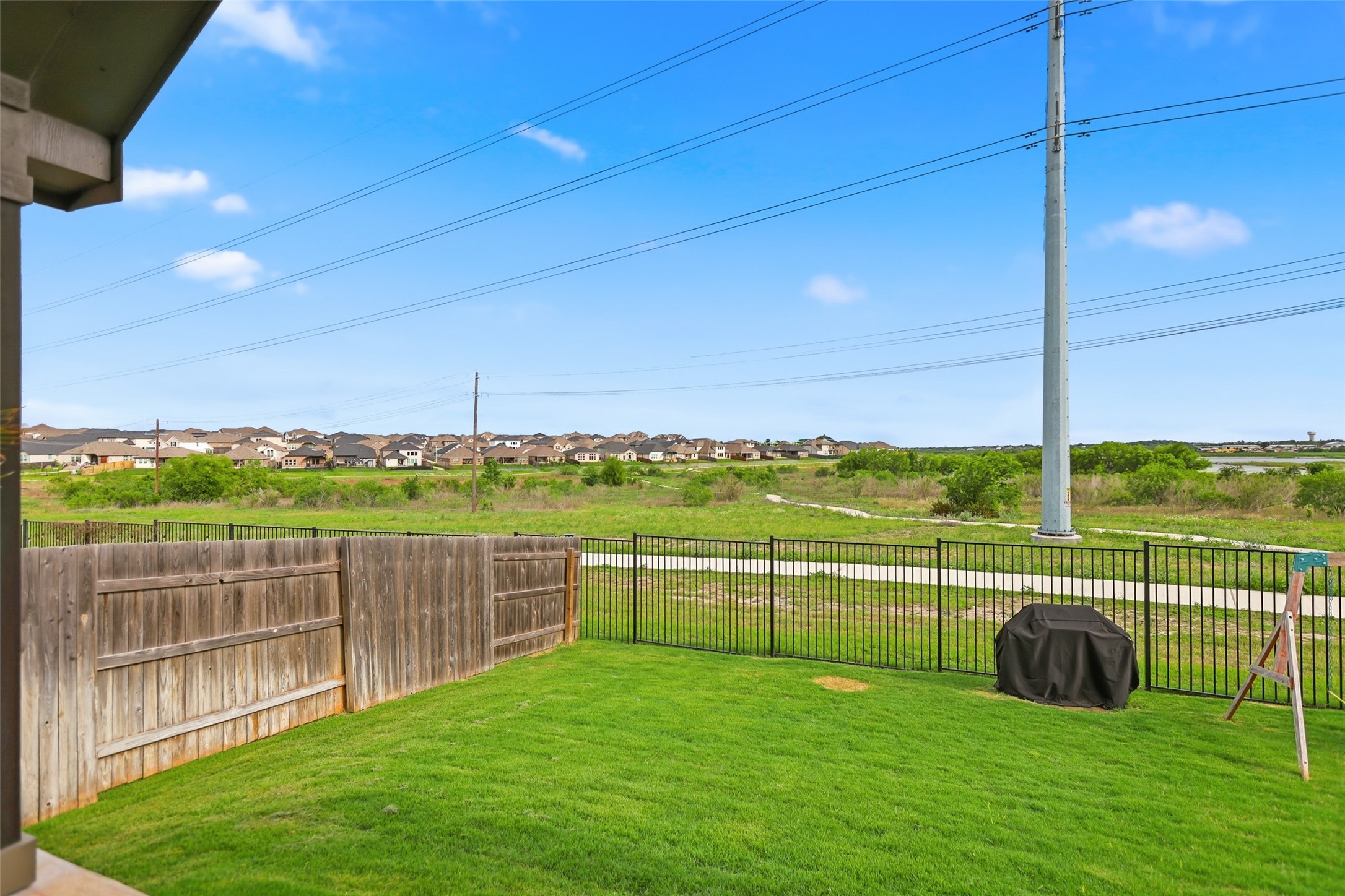 544 Cherrystone Loop Buda, TX 78610 - Photo 32 of 40 a view of a green field with sitting area
