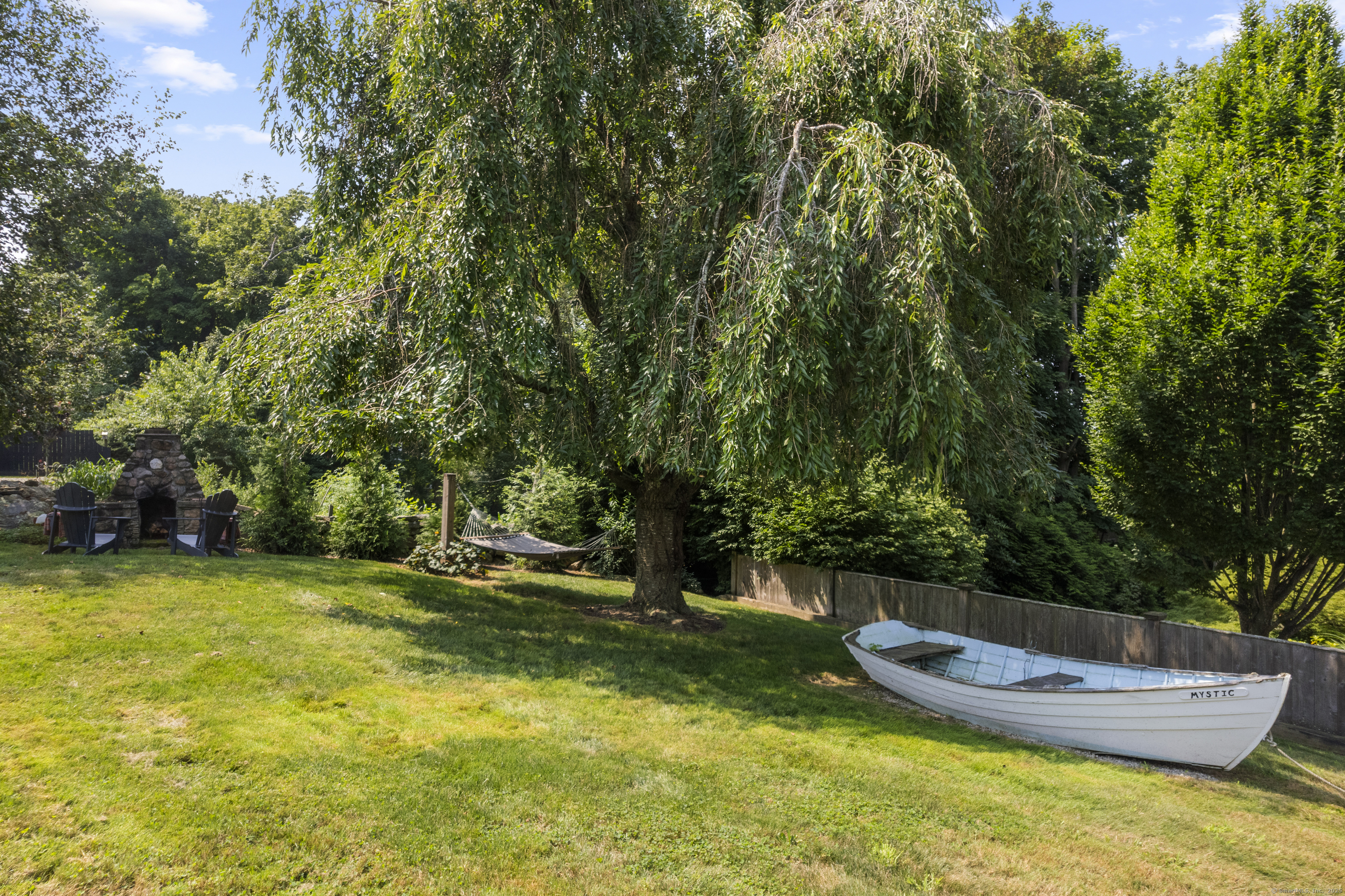 22 School Street Stonington, CT 06355 - Photo 38 of 39 a view of a backyard with swimming pool