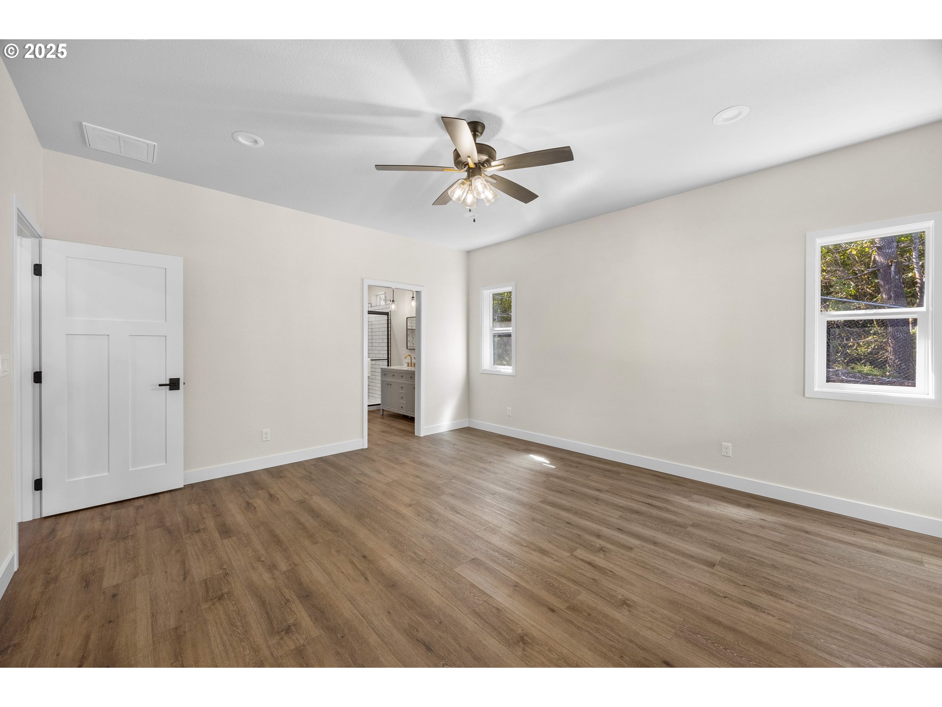 1 Bonnett Way Florence, OR 97439 - Photo 11 of 33 an empty room with fan and windows