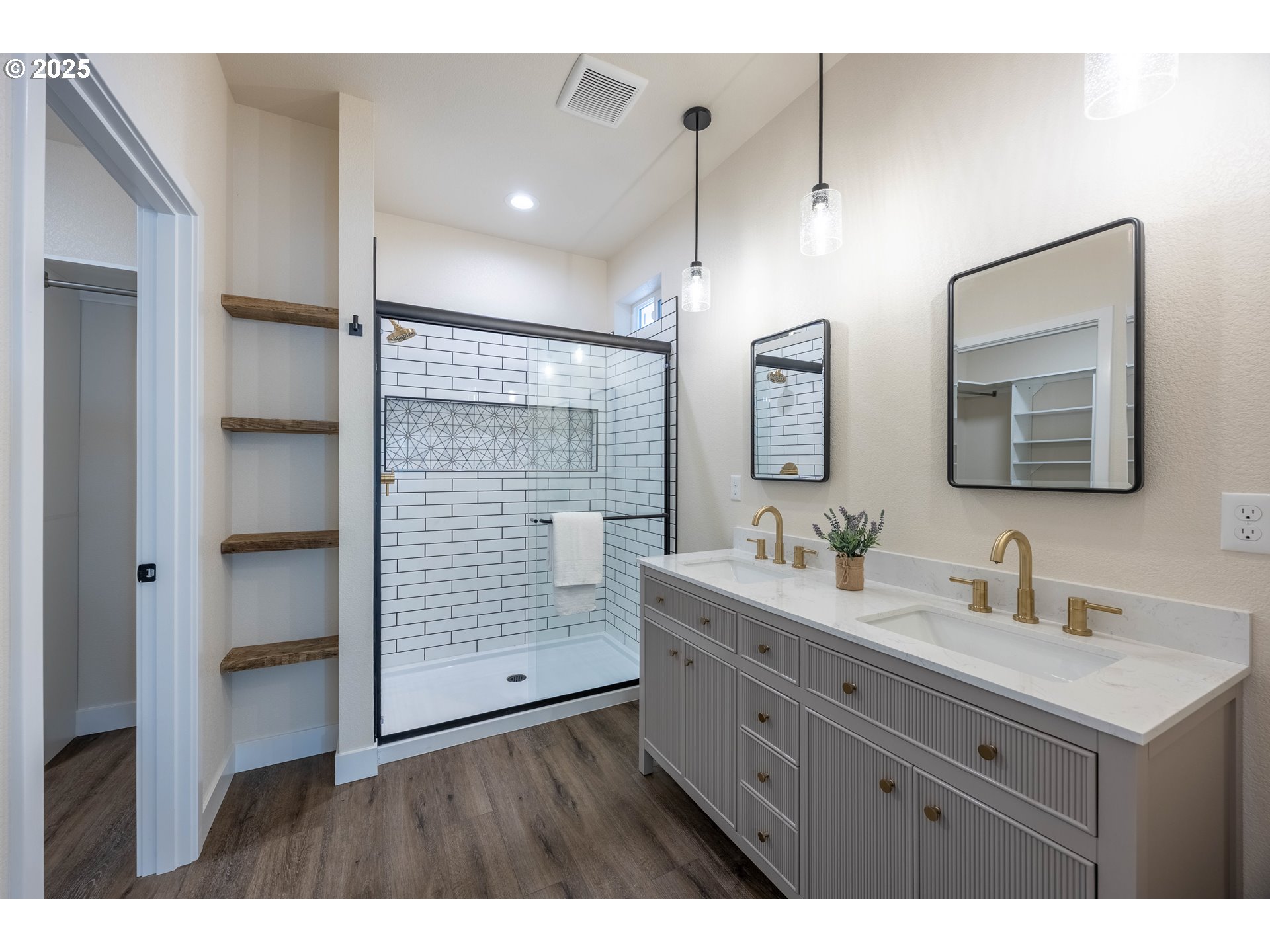 1 Bonnett Way Florence, OR 97439 - Photo 14 of 33 a bathroom with a double vanity sink and a mirror