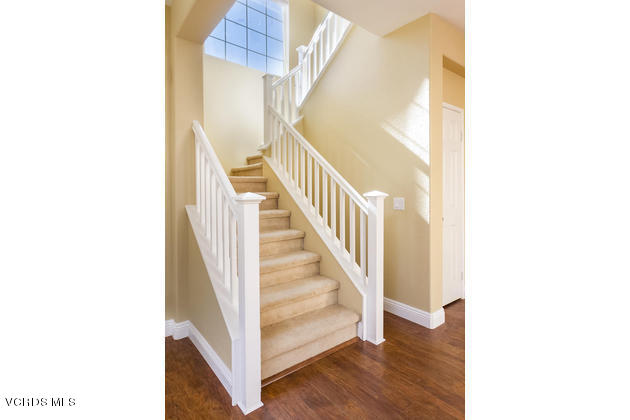 2001 Ribera Drive Oxnard, CA 93030 - Photo 9 of 20 a view of a hallway with wooden floor