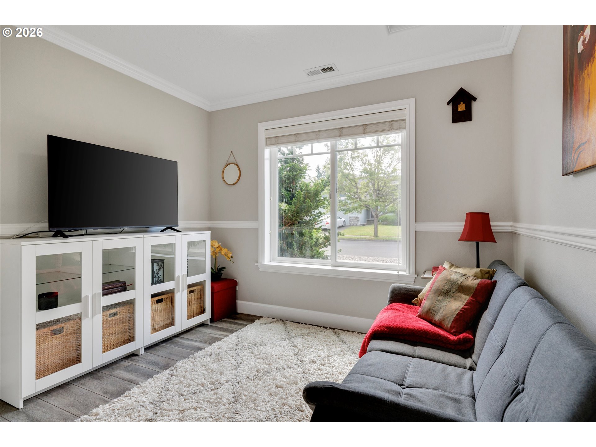 3769 10th Street Hubbard, OR 97032 - Photo 14 of 47 a living room with furniture and a flat screen tv