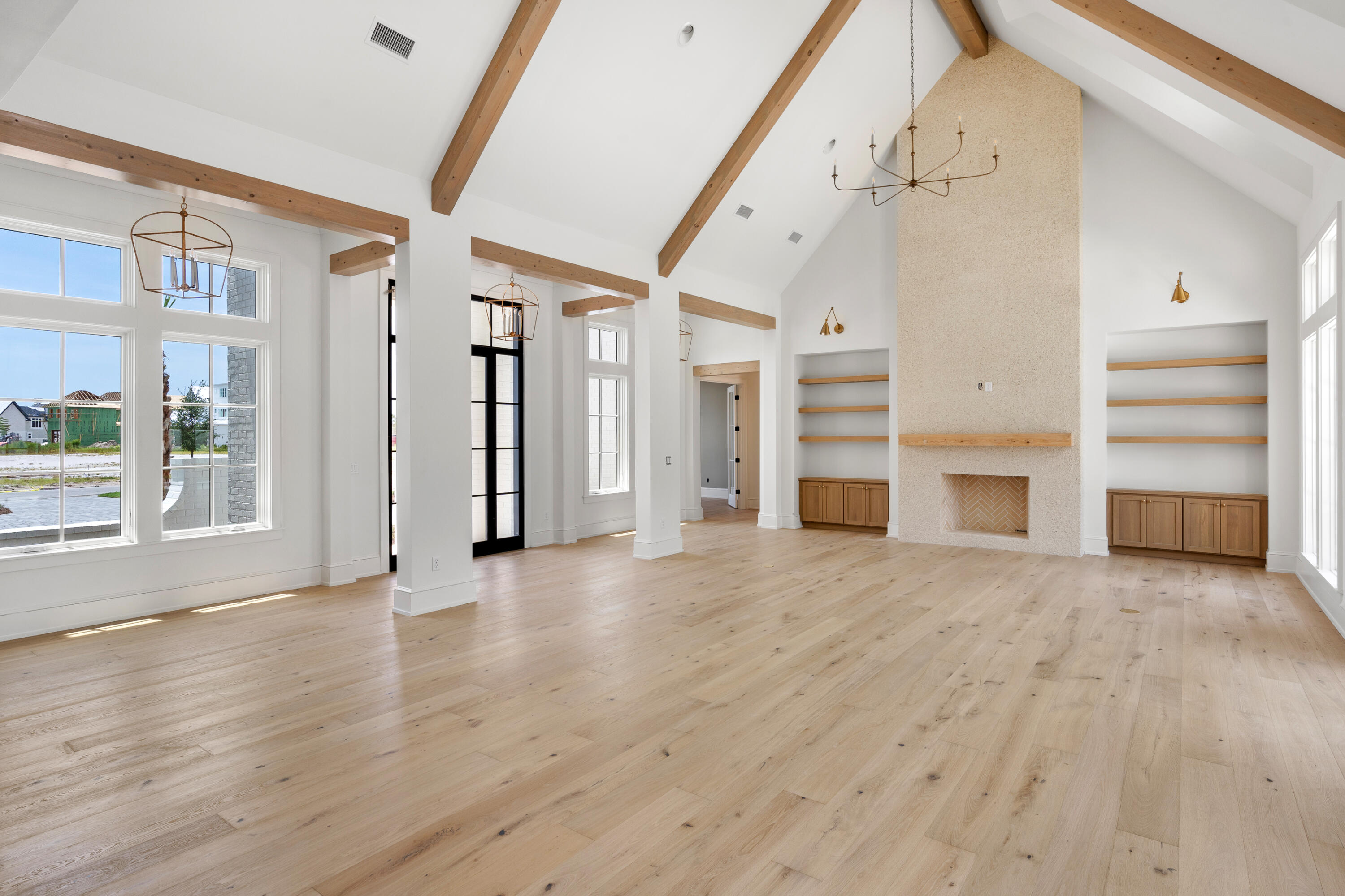 181 Quail Hollow Inlet Beach, FL 32461 - Photo 11 of 47 a view of an empty room with wooden floor and a window