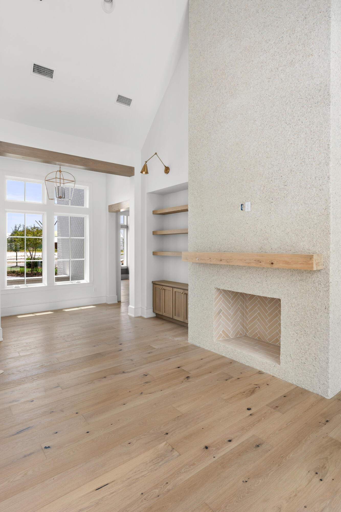 181 Quail Hollow Inlet Beach, FL 32461 - Photo 12 of 47 a view of an empty room with a window and fire place