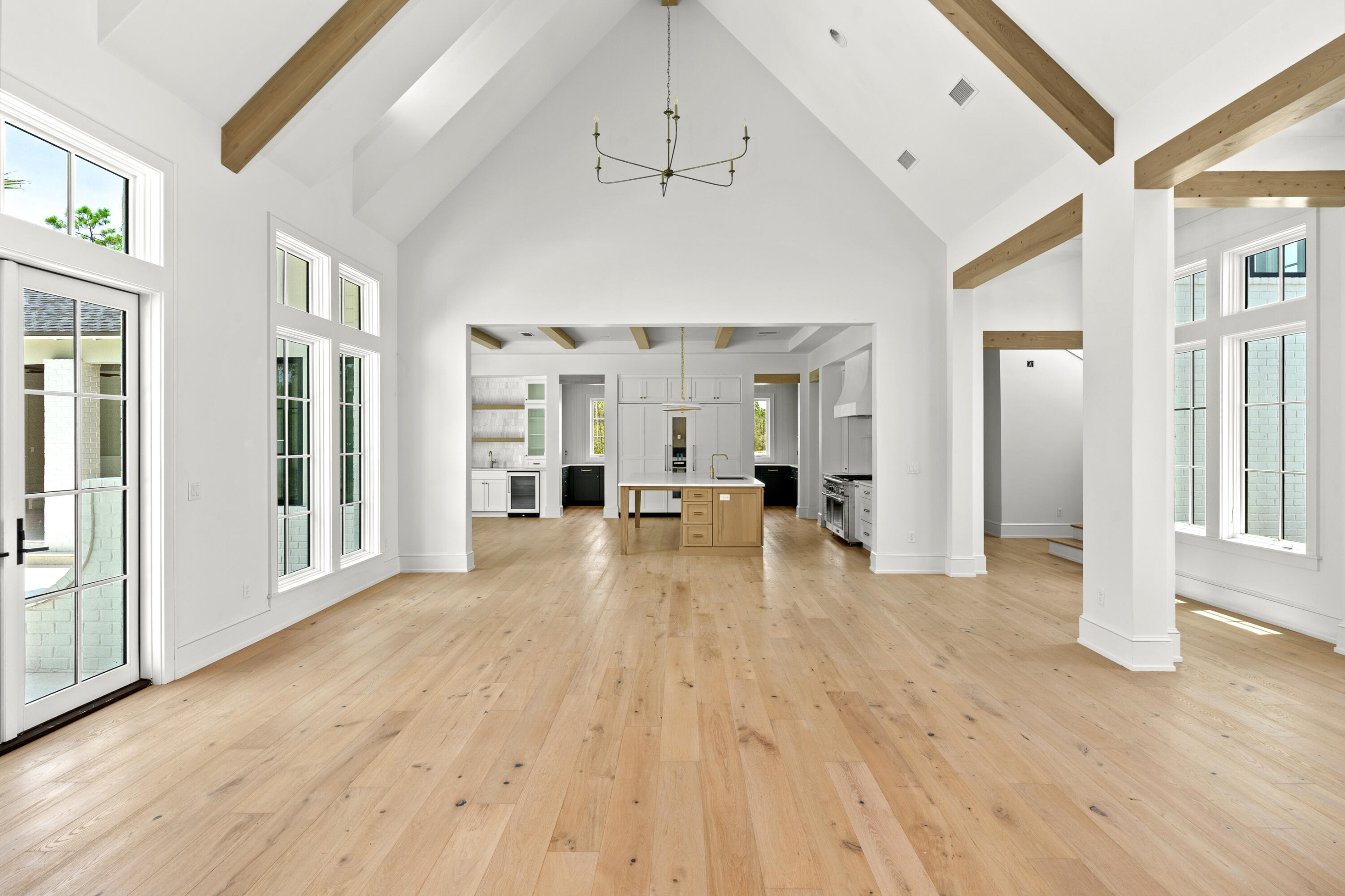181 Quail Hollow Inlet Beach, FL 32461 - Photo 17 of 47 a view of a livingroom with wooden floor and furniture
