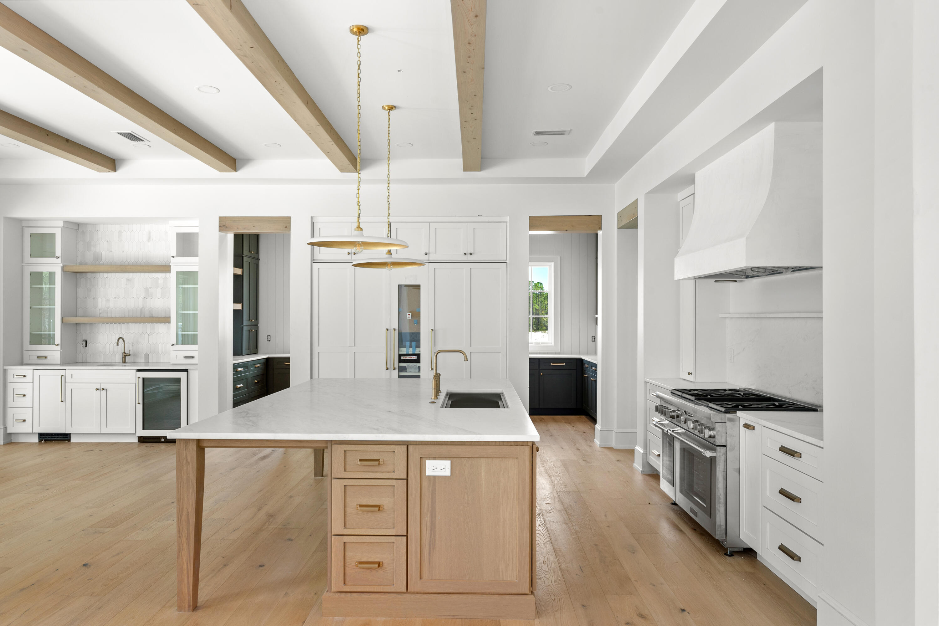 181 Quail Hollow Inlet Beach, FL 32461 - Photo 18 of 47 a kitchen with stainless steel appliances kitchen island granite countertop a stove and a refrigerator