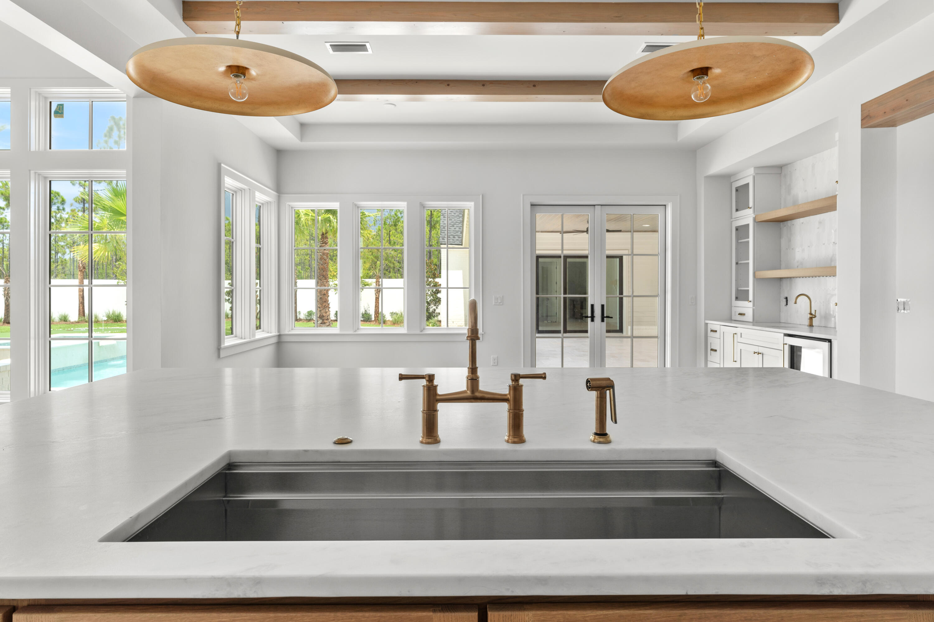 181 Quail Hollow Inlet Beach, FL 32461 - Photo 23 of 47 a room with a window and a chandelier