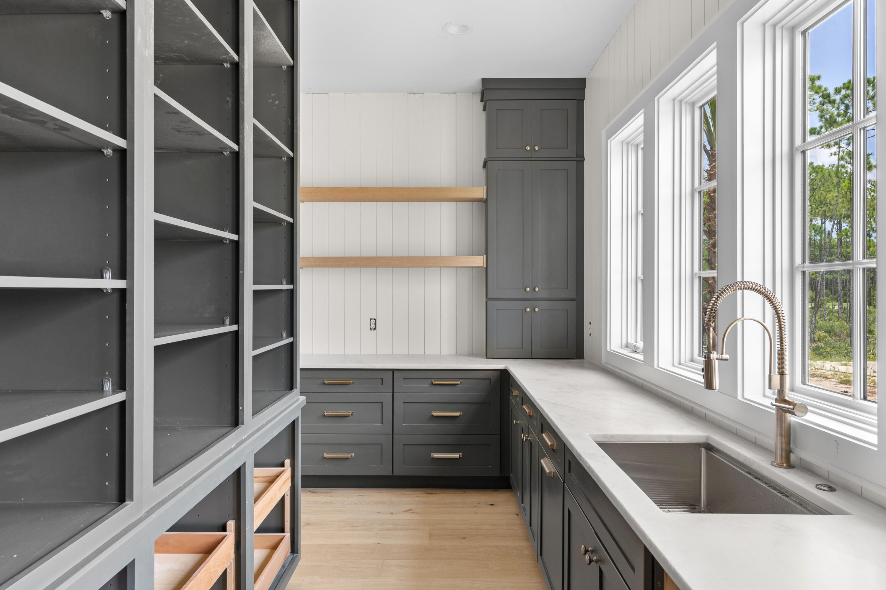 181 Quail Hollow Inlet Beach, FL 32461 - Photo 28 of 47 a kitchen with a refrigerator and a sink