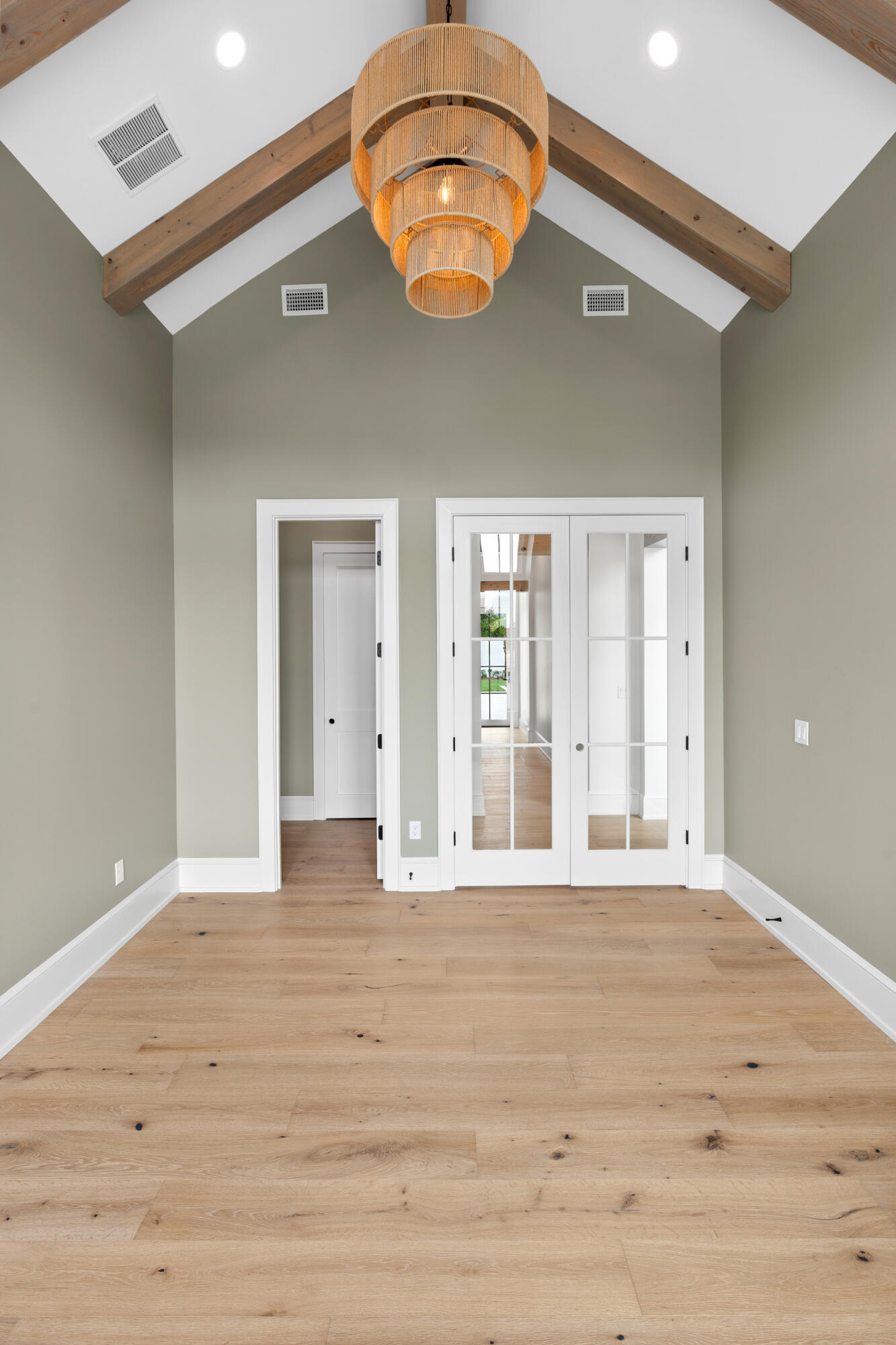 181 Quail Hollow Inlet Beach, FL 32461 - Photo 31 of 47 a view of an empty room with wooden floor and windows