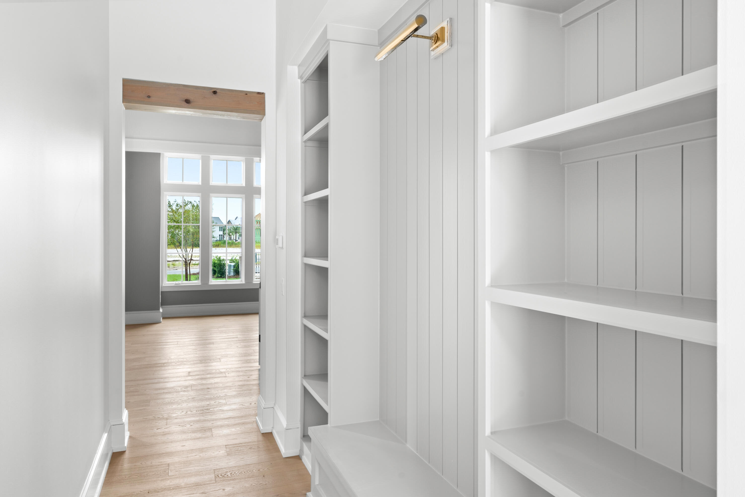 181 Quail Hollow Inlet Beach, FL 32461 - Photo 32 of 47 a view of a hallway with wooden floor and a room