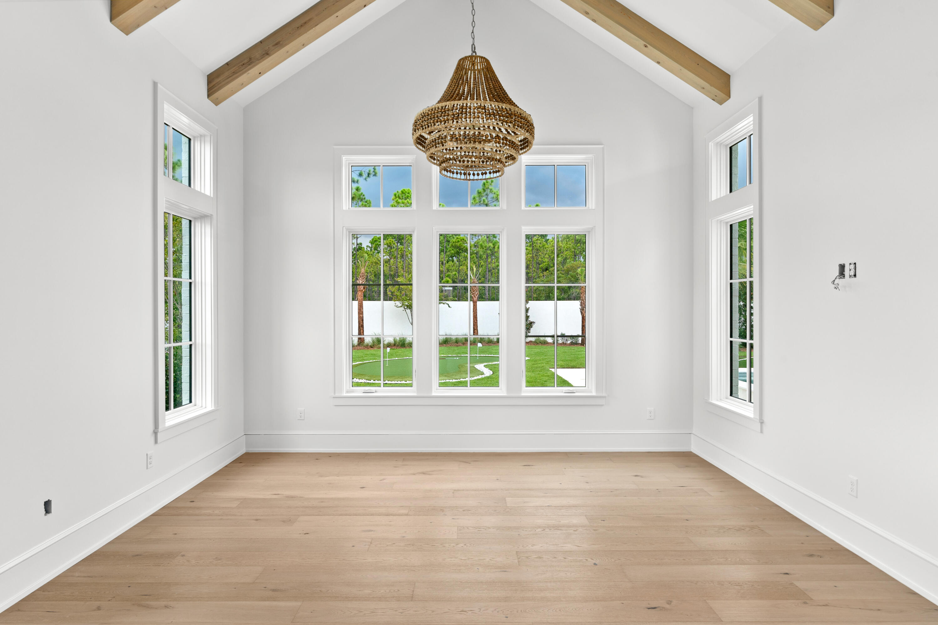 181 Quail Hollow Inlet Beach, FL 32461 - Photo 33 of 47 an empty room with windows and wooden floor