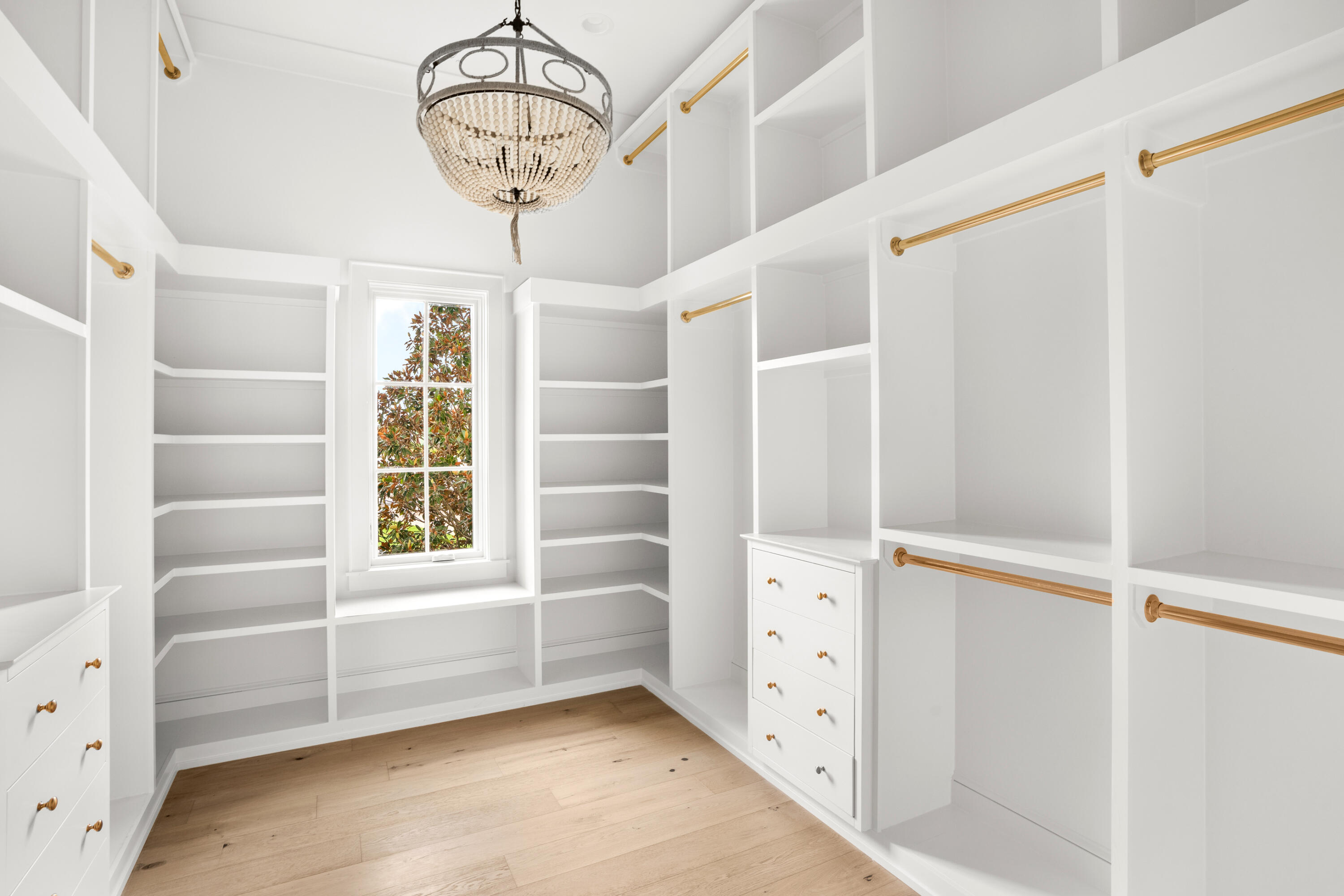 181 Quail Hollow Inlet Beach, FL 32461 - Photo 37 of 47 a view of walk in closet with empty racks