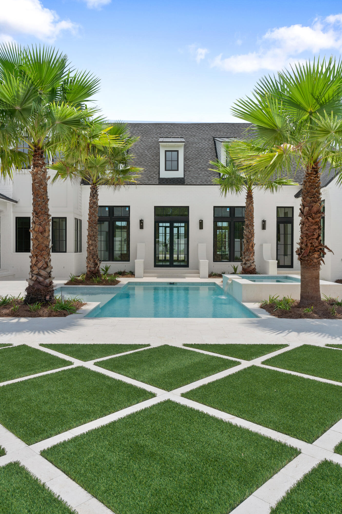 181 Quail Hollow Inlet Beach, FL 32461 - Photo 45 of 47 a view of a house with a swimming pool and a yard