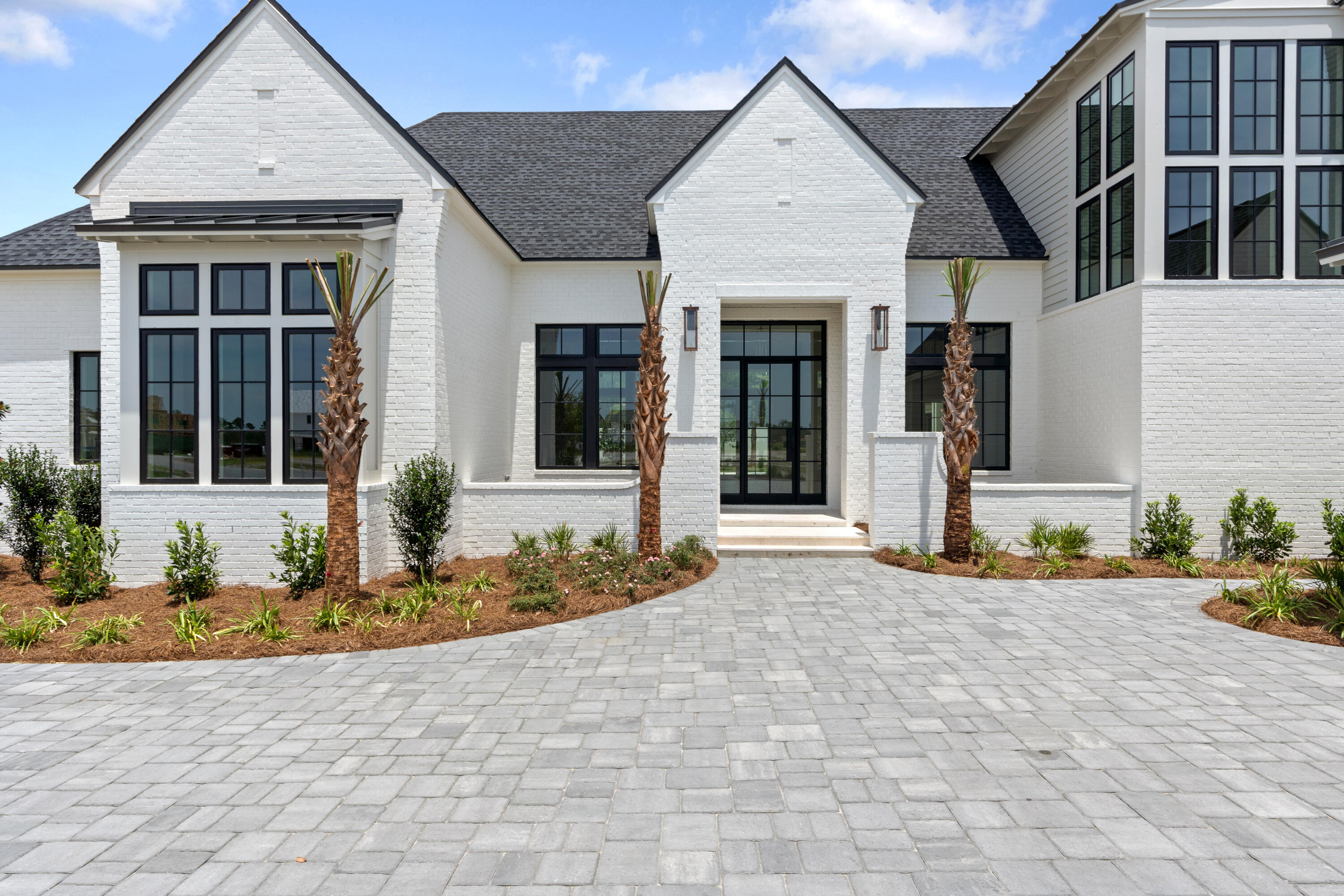 181 Quail Hollow Inlet Beach, FL 32461 - Photo 5 of 47 a front view of a house with basket ball court and potted plants