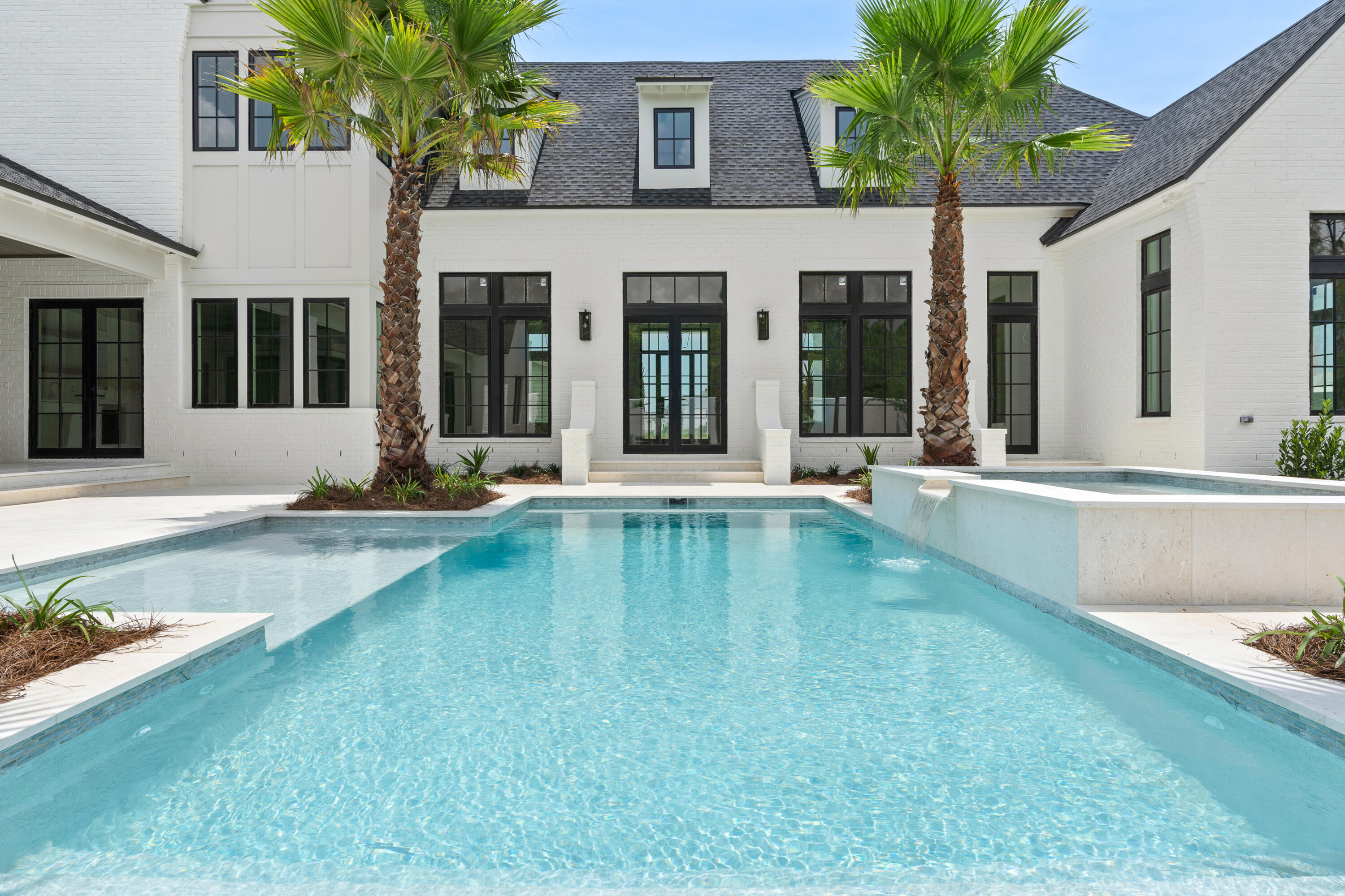 181 Quail Hollow Inlet Beach, FL 32461 - Photo 6 of 47 a front view of a house with swimming pool and porch with furniture